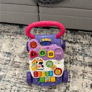 Interactive Learning Walker with Pink Handle